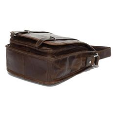 * Handsome leather features and an adjustable strap
 * Compact, "road warrior" design for easy travel
 * 3 different storage compartments Brown Leather Satchel Bag, Leather Duffel Bag, Brown Leather Satchel, Leather Duffel, Practical Bag, Togo Leather, Leather Satchel Bag, Jewelry For Men, Dark Brown Leather