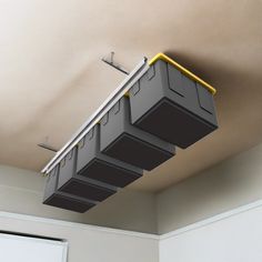 an overhead storage box suspended from the ceiling