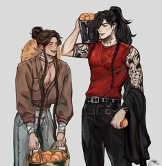 two people with tattoos and one holding a basket full of food while the other looks on