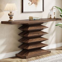 a modern console table with books on it