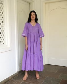 Amethyst three tier comfort fit dress with side pockets. Made of hand woven cotton in self textured weave. Shop this dress only at Kamakhyaa #kamakhyaa #womensfashion #dress #violetdress #maxidress #tiereddress #purpledress Tiered Dresses, Western Dresses For Women, Tier Dress, Sustainable Clothing Brands, Lavender Dresses, Western Wear For Women, Conscious Fashion, Cotton Midi Dress, Dress Indian