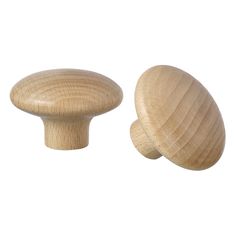 two wooden knobs on a white background