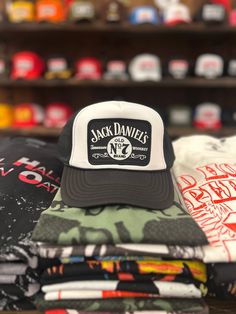 Classic Jack Daniels graphic trucker hat Adjustable snap back One size fits most Curved, moldable bill Casual Baseball Cap With Graphic Print And Flat Brim, Casual Baseball Cap With Graphic Print, Casual Flat Brim Baseball Cap With Graphic Print, Casual Adjustable Trucker Hat With Graphic Print, Graphic Print Snapback Hat With Flat Bill For Streetwear, White Snapback Trucker Hat For Streetwear, White Hip Hop Trucker Hat With Letter Print, White Trucker Hat With Letter Print For Streetwear, White Hip Hop Trucker Hat For Outdoor