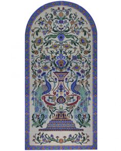 an intricately designed rug with blue, green and red accents on the border is shown