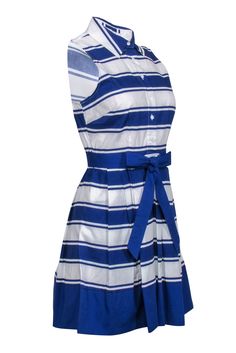 Take a peek at the bewitching beauty of this Milly shirt dress, where bold royal blue and white stripes come together to create a head-turning statement piece with a nautical feel. The fit-and-flare design, complete with a coordinating belt, pointed collar, and button-up front, exudes effortless sophistication, while the pleated skirt adds a playful touch. Perfect for a yacht party or a coastal retreat, pair this lightweight dress with wedged sandals and a sun hat for a chic ensemble that's both Blue Nautical Spring Dresses, Blue Nautical Dress For Summer, Blue Nautical Summer Dress, Elegant Summer Dresses With Striped Collar, Blue Vertical Stripes Dress For Daywear, Blue Sailor Summer Dresses, Blue Sailor Style Summer Dresses, Sailor Style Blue Summer Dresses, Blue Cotton Dress With Vertical Stripes