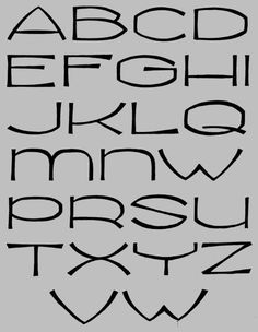 the alphabet is drawn in black ink on a gray background