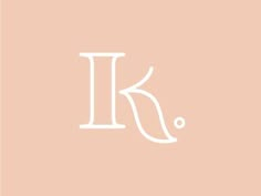 the letter k is inscribed in white on a pink background