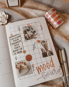 an open notebook with pictures on it next to some markers and pens, along with two coffee mugs