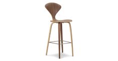 a wooden bar stool with a metal frame and backrest on an isolated white background