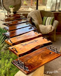 several wooden trays with writing on them