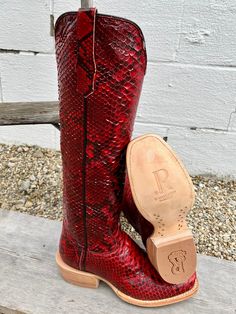 These show-stopping red python boots definitely deserve a second look! We are so excited to present these 17″ beauties from R. Watson! Heel - Cowboy Toe - Cutter Top - Python Top Color - Red & Black Vamp - Python Vamp Color - Red & Black RESTRICTIONS ON SHIPMENT OF EXOTIC BOOTS CALIFORNIA (See Cal. Penal Code § 653o(a)). Python Boots, Black Python, Western Store, Cowgirl Western, Western Cowgirls, Cowboy Boots Women, Beautiful Boots, Western Cowgirl, Boots Women