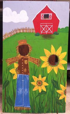 a painting of a boy and sunflowers in front of a barn