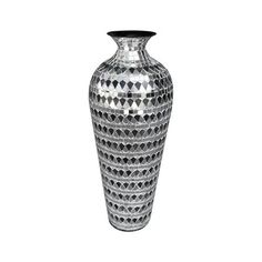 a silver vase is shown on a white background