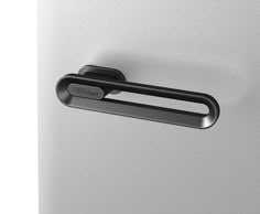 an image of a door handle on the front of a white refrigerator with black handles