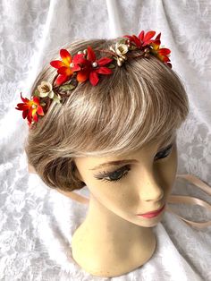 "Beautiful brick orange and sunburst flowers encircle this simple bridal hair wreath! Small beige flowers among the woven gold pip berry and leaf vine complete the look. For a wedding day touch pearl beads have been placed in the center of all those beautiful blossoms! Lightweight and sturdy, this crown measures about 22\" and ties closed with ribbon. To view floral hair pins: https://www.etsy.com/shop/ThePepperedRose?ref=listing-shop-header-item-count§ion_id=21379398 To view hair clips: https:/ Simple Bridal Hair, Autumn Crown, Floral Hair Piece, Bridal Hair Wreath, Flowers Simple, Beige Flowers, Floral Hair Pieces, Floral Hair Pins, Hair Wreath