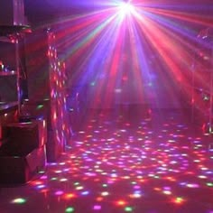 disco lights are shining brightly on the dance floor