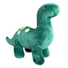 a green stuffed dinosaur toy sitting on top of a white background