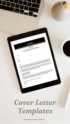 a tablet computer sitting on top of a white desk next to a cup of coffee