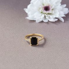 Exquisite ring set with an 8x6 mm Black Onyx and 10 natural diamonds. Beautifully made and finished in your choice of gold. - Made to Order, perfectly finished, Fast shipping fully insured and trackable online. - Made in 10/14/18 Karat Solid gold, Choose from White, Yellow and Rose. - Onyx info: Onyx 8x6 mm, radiant cut, 1.72 ct - DIamond info: 10 Natural Diamonds 1.25 mm, VS-E, 0.12 ctw - Arrives gift ready with a certificate of authenticity. Formal Onyx Open Ring, Classic Onyx Rings For Promise, Classic Onyx Promise Ring, Elegant Onyx Rings With Diamond Accents, Elegant Onyx Signet Ring With Gemstone, Modern Onyx Ring For Anniversary, Formal Onyx Diamond Ring With Gemstone, Elegant Onyx Signet Ring As Gift, Timeless Onyx Rings For Anniversary