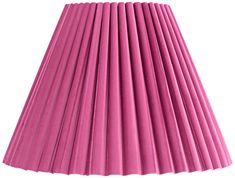 a pink pleated lamp shade on a white background