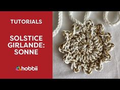 the video shows how to make a crochet pattern for a sun ornament