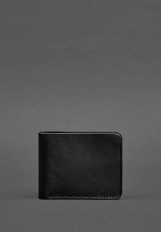 Introducing our High-Quality Compact Men's Leather Wallet, a perfect blend of elegance and functionality. Crafted from premium genuine leather, this slim wallet is designed for the modern gentleman who values both style and convenience. It features multiple card slots and a spacious compartment for bills, all while maintaining a sleek and minimalist profile. The refined leather finish adds a touch of sophistication, making it a timeless accessory for any occasion. Durable and lightweight, this w Minimalist Profile, Blank Notes, Leather Finish, Elegant Man, Charm Making, Designer Wallets, Modern Gentleman, Slim Wallet, Leather Pieces