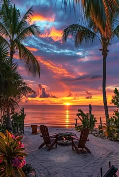 the sun is setting over the ocean with chairs and palm trees in front of it