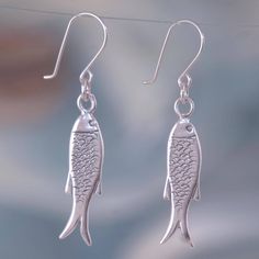 Symbolizing depth of knowledge these fish earrings are designed by Gianluca Anzani in Taxco. The sterling silver earrings are crafted by hand with admirable detail. .925 Sterling silver Infinite Money, Body Studies, Simple Silver Earrings, Depth Of Knowledge, Fish Earrings, Earring Inspo, Silver Sea, Silver Dangle Earrings, Sterling Silver Dangle Earrings