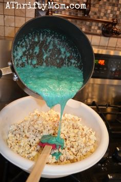 a pan filled with food sitting on top of a stove