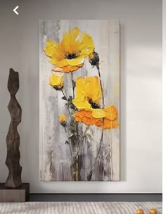 an abstract painting with yellow flowers on the wall