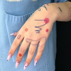 a woman's hand with some writing on it