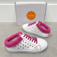 New In Box Style Child “Brooke” Slip On Mule Sneakers. White Faux Leather With Shiny Silver Round Studs. Dark Pink Elastic Laces And Furry/Teddy/Fuzzy/Faux Shearling/Wooly/Sherpa Trim. Graffiti Insoles. White And Orange Rubber Soles. Come In Original Box With Original Stuffing. Size: 36 (4-4.5) Mule Sneakers, White And Orange, Slip On Mules, Elastic Laces, Shiny Silver, Sneakers White, Dark Pink, Mule, Kid Shoes