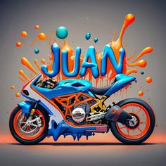 a motorcycle with the word juan painted on it's side and orange, blue, and white paint splatters all around