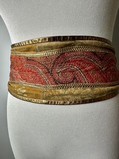 Very unique belt design. I'm guessing this was made by someone in the 70's with a Victorian paisley wool textile .  It also is stenciled in shiny gold design pattern.  It's definitely unique.  It's widest at the front and tapers and ties in the back.  It's a supple soft suede or skin,  It fits at about 29" up to 34" approximately.  It is in somewhat rough, or used  condition. Someone probably really loved it!  Price will be reflected. I just found it interesting.. the combination of materials an Unique Belts, Paisley Art, Belt Design, Vintage Belt, Stenciling, Vintage Belts, Suspender Belt, Gold Design, Portland Oregon