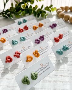 These handmade knot stud earrings are crafted from high-quality polymer clay and feature a trendy knot design in various colors, including purple, olive green, blue, yellow, and red or you may request your favorite color.  If buying a 2 or 3 pair stud set, please specify your color choices in the personalization box. The earrings are lightweight and comfortable to wear, making them perfect for everyday wear or special occasions. Each pair of earrings is carefully handmade and features unique det Clay Earring Studs, Twisted Earrings, Knot Jewelry, Maid Of Honor Gift, Unique Products Design, Knot Stud Earrings, Knot Studs, Jewelry Knots, Jewelry Bridesmaid