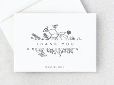 a thank card with the words, thank you and an image of flowers on it