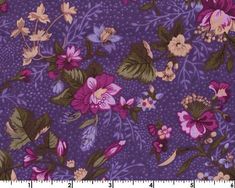 a purple flowered fabric with green leaves and pink flowers on the bottom half of it