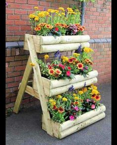 a wooden ladder with flowers growing on it and the words instagramm above it