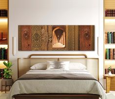 a bed sitting in a bedroom next to a book shelf