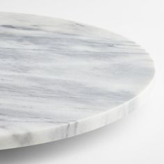 a white marble table top on a white background