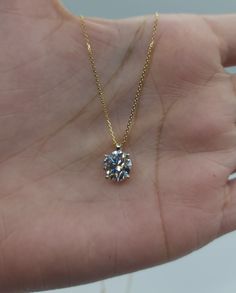 This is a beautiful Lab Grown diamond design pendant. It is set in real solid 14Kt Gold and the chain is 14Kt Gold as well.  You can choose if you want 14Kt White Gold, 14Kt Yellow Gold or 14Kt Rose Gold.  It has a special loop where the chain goes through so that the diamond sits comfortably on you when you wear it. We have a lot of beautiful jewelry with natural diamonds.  If any listing states "diamond" then it is a natural diamond. If the listing states "Lab Grown" it is a Lab Grown diamond. Gold Moissanite Solitaire Necklace For Formal Events, Formal Gold Moissanite Solitaire Necklace, Gold Solitaire Necklace With Diamond Cut Cubic Zirconia, Gold Solitaire Necklace With Brilliant Cut, Sterling Silver Solitaire Necklace In Gold With Brilliant Cut, Gold Solitaire Necklace With Diamond Accents And Moissanite, Gold Solitaire Necklace With Moissanite And Diamond Accents, Dazzling 14k Gold Solitaire Necklace, Gold Solitaire Moissanite Necklace