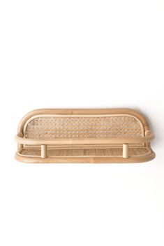 a wooden tray with bamboo handles on a white background