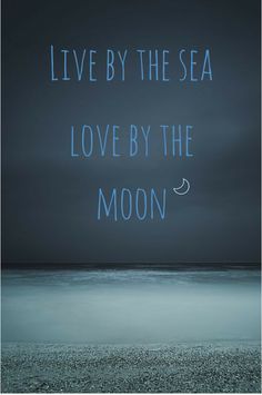 an ocean scene with the words live by the sea love by the moon