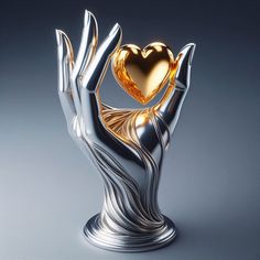 a silver and gold sculpture with a heart in it's palm, on a gray background