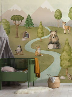 a child's room with a bear mural on the wall and forest scene painted on the wall