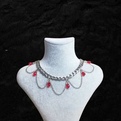 ▪Grunge Choker▪ Gothic design formed by the combination of red and chain ❤ Really cool chunky chain choker necklace ▪ 35 cm and adjustable ▪ It is handmade 🖤 ▪ If you have any questions, I'll be happy to answer 💌 ▪ Avoid contact with perfume or other chemicals 🌿 Emo Style Festival Jewelry With Chain, Red Gothic Metal Necklace, Emo Metal Necklace For Festivals, Emo Jewelry With Adjustable Chain For Parties, Emo Style Party Jewelry With Chain, Emo Party Jewelry With Chain, Emo Metal Necklace For Party, Emo Metal Necklace For Concerts, Emo Style Metal Necklace For Party