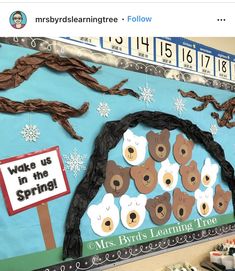 the bulletin board is decorated with brown bears and snowflakes on it's sides