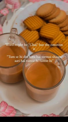 two cups of tea sit on a plate next to some cookies and crackers, with the words word might be chat but the emotion is