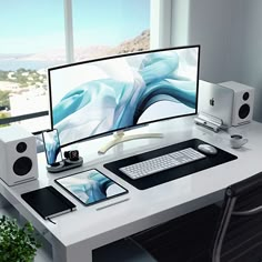 a computer monitor sitting on top of a white desk