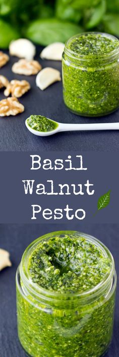 basil walnut pesto in a jar with spoons on the side and green leaves around it